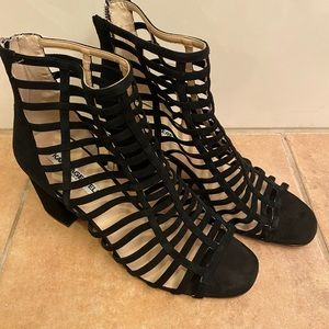 Karl Largerfeld Paris.     Black leather rear zip dress heals.